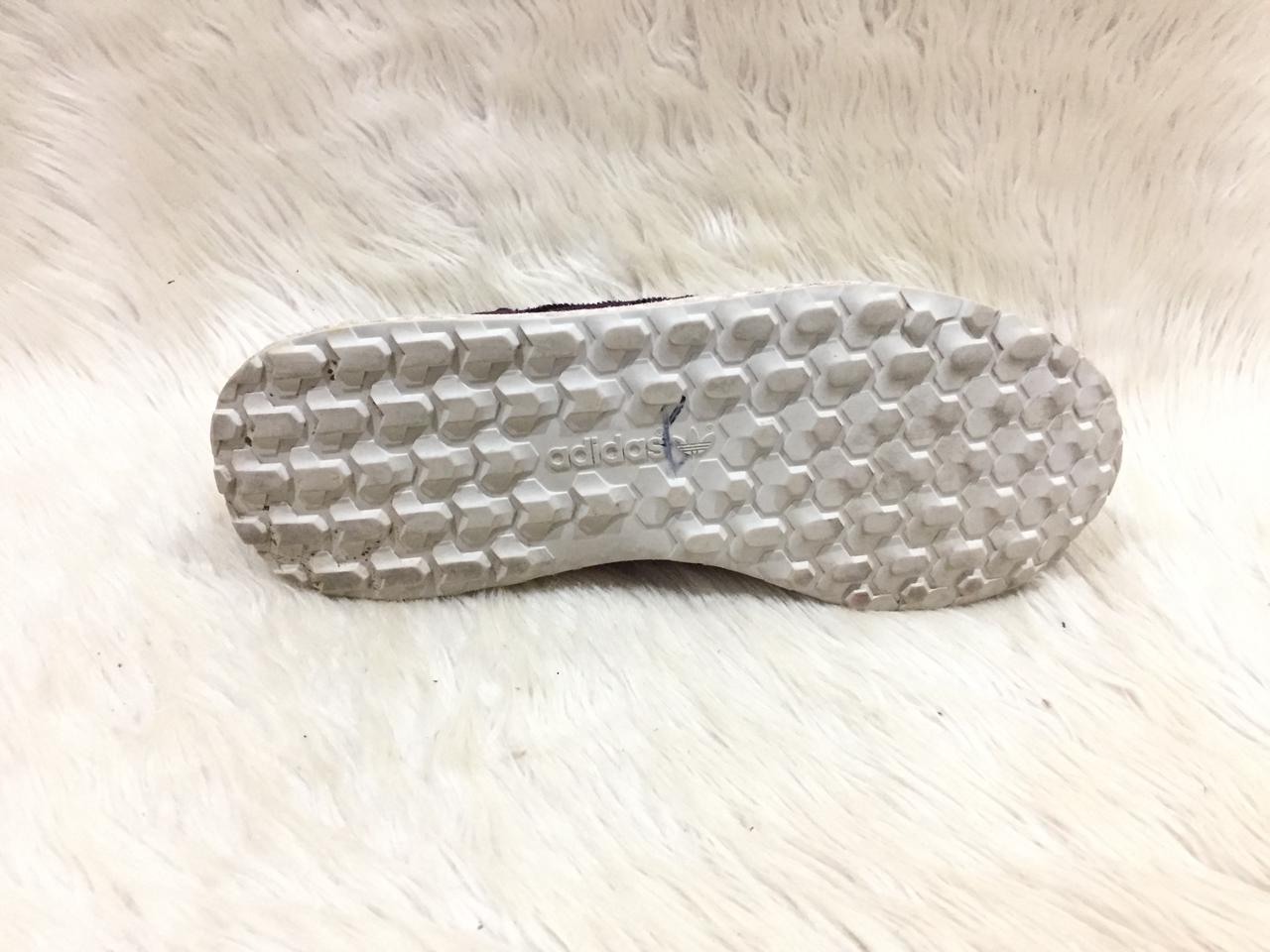 Adidas Forest Grove sneaker in a "Red Night" colorway