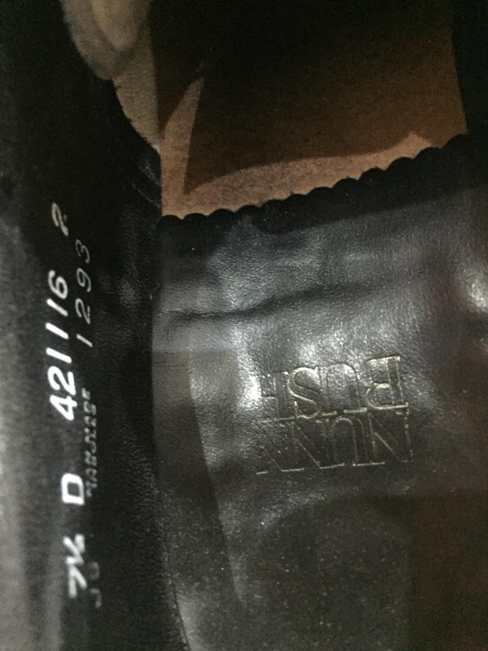 Nun bush lace-up dress shoes.